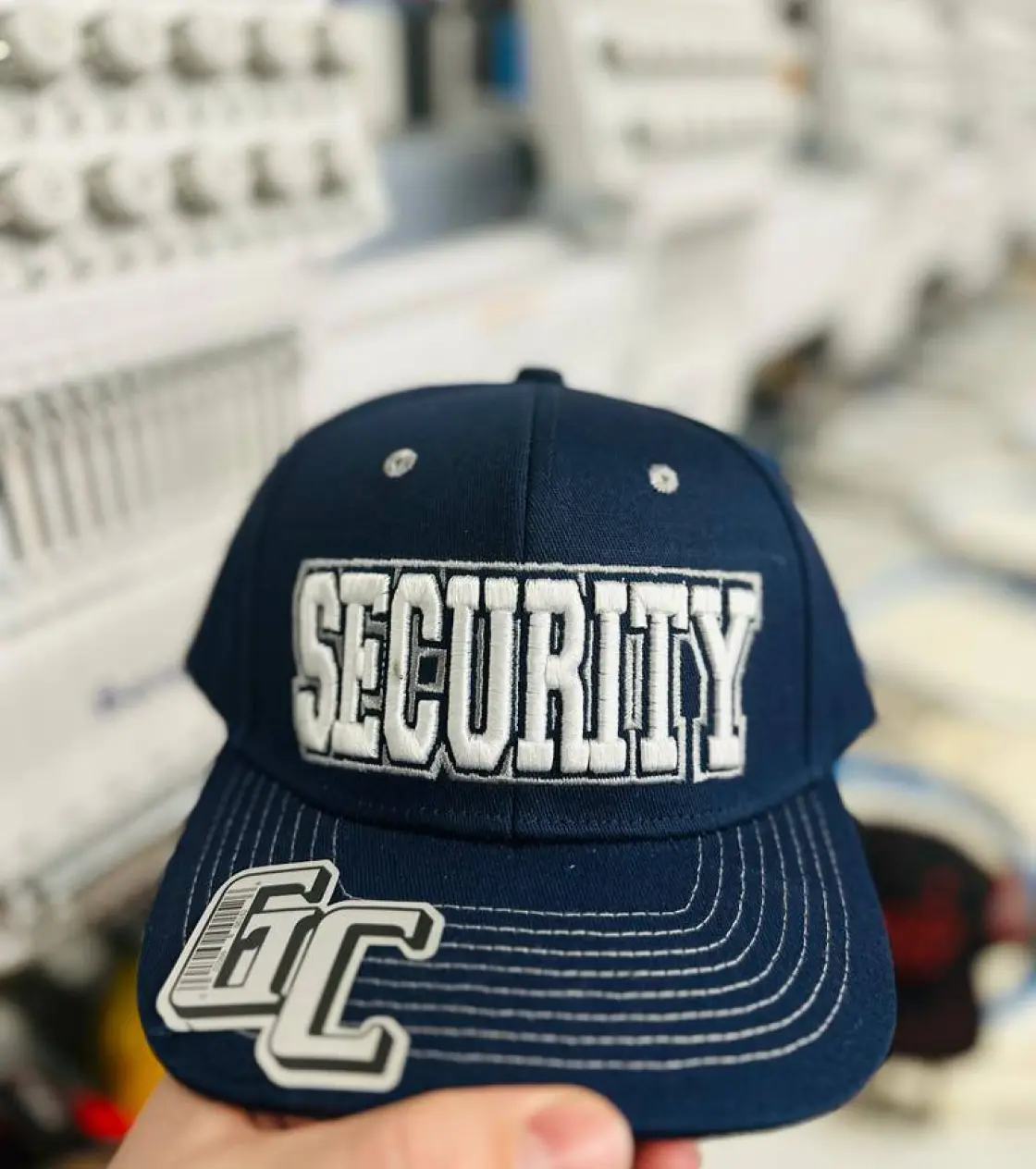 Blue hat with security embroidery