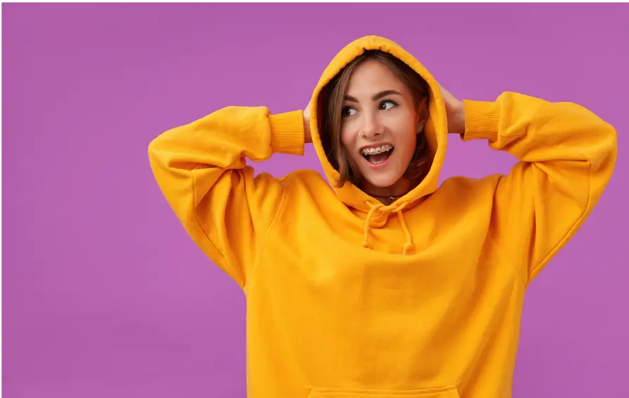 Girl in orange color hoodie
