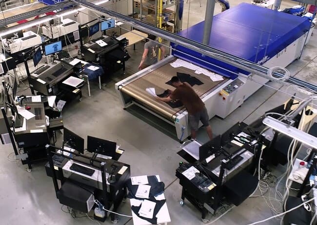 An overhead view of a factory with many machines