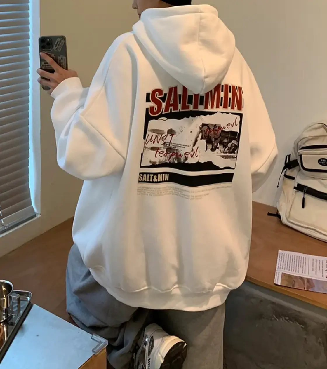White hoodie with print on the back